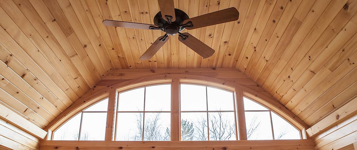 Detail of an addition, windows and bowed ceiling.